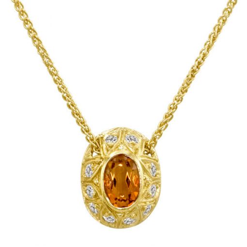 product image of oval orange gemstone set in yellow gold and diamonds