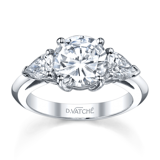 product image of round and pear shape three-stone diamond engagement ring in white metal from Vatche