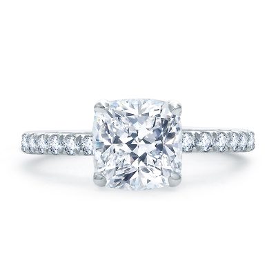 Diamond engagement ring set with cushion shaped diamond in white metal