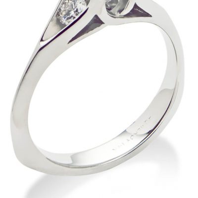 product image of thee-stone round engagement ring from Toby Pomeroy