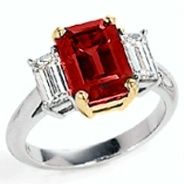 product image of three-stone emerald cut ruby ring with side diamonds