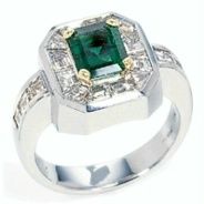product image of emerald cut emerald ring with emerald shaped diamond halo in mixed metals