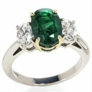 product image of three-stone oval shaped emerald and diamond ring