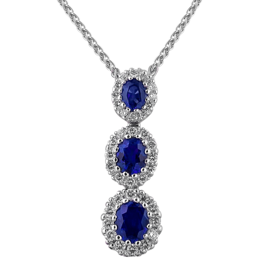 product image of Spark Creations blue sapphire and diamond halo three stone drop pendant