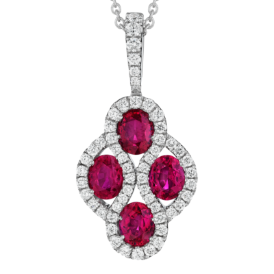 detail shot of Spark Creations ruby and diamond small honeycomb style pendant with diamond bail