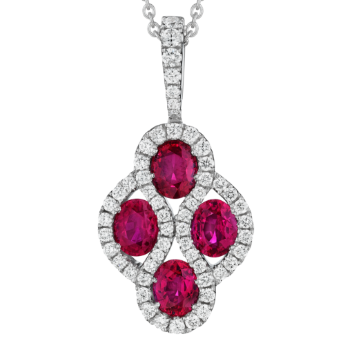 detail shot of Spark Creations ruby and diamond small honeycomb style pendant with diamond bail