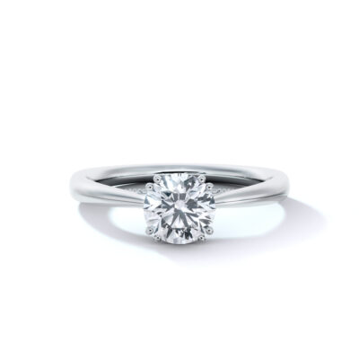 product image of double prong engagement ring with diamond bridge from Sasha Primak in platinum